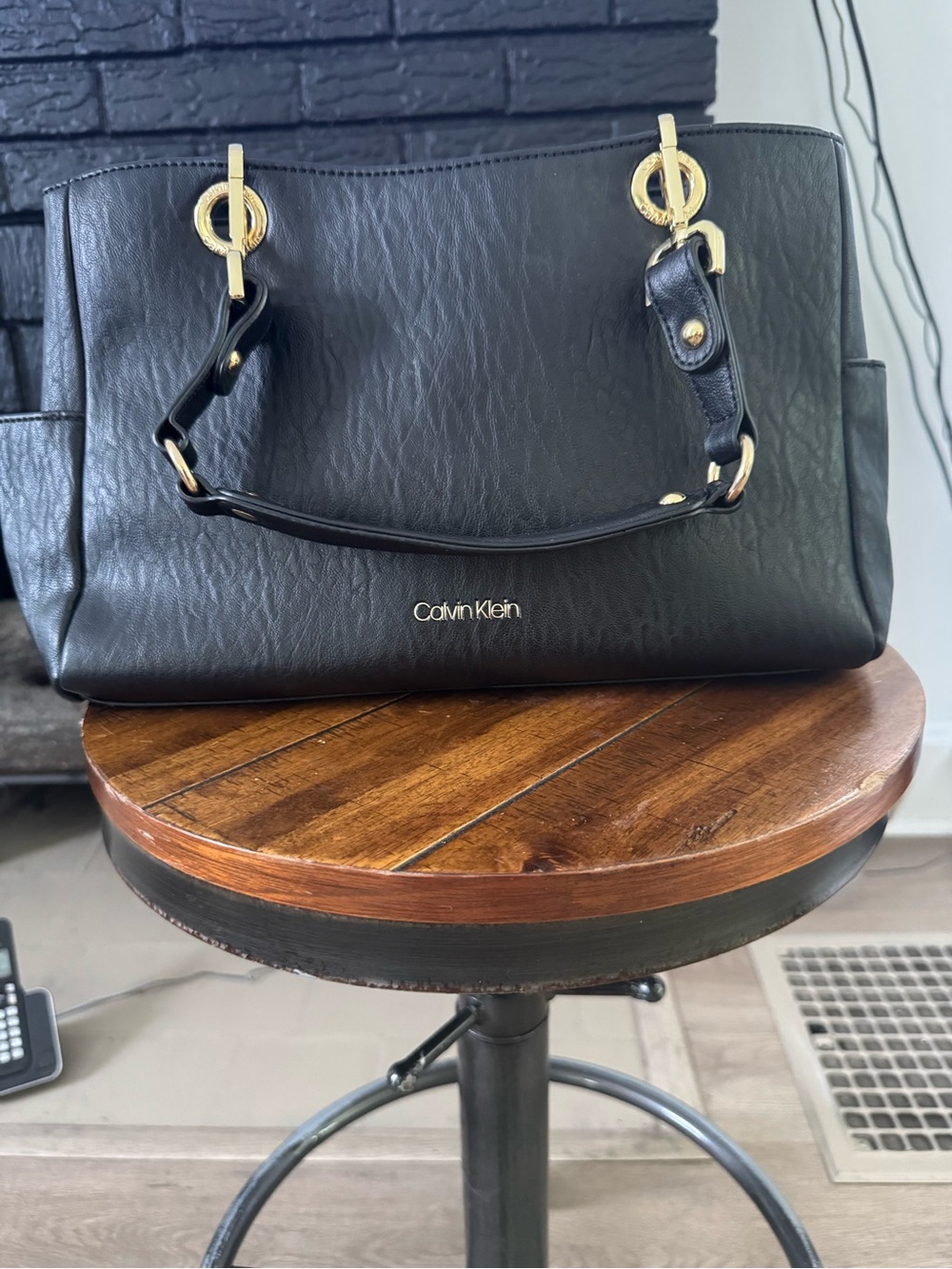 Calvin Klein Black Leather Satchel with Gold Accents
